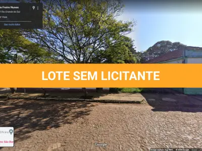 LOTE 001 - TERRENO E IMÓVEL COMERCIAL